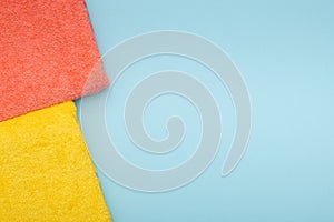 Composition of colored cotton towels. The concept of softness and purity