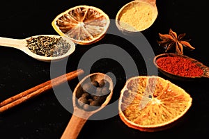 Composition of condiment, close up. Set of spices, grey background.