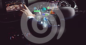 Composition of data processing on interactive screen over businessman using navigation driving car