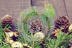 Composition with decorated Christmas tree on dark rustic wooden