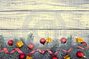 Composition with decorated Christmas tree on white rustic wooden