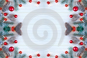 Composition with decorated Christmas tree on white rustic wooden background with copy space for text. New Year Frame for