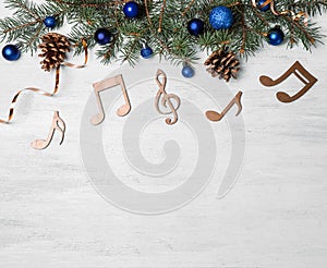 Composition with decorative music notes and space for text on wooden background