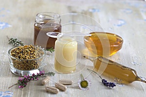 Composition with dietary supplement - organic honey bee product photo