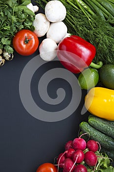 Composition with different fresh organic fruits and vegetables.