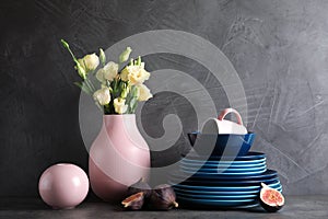 Composition with dinnerware on table