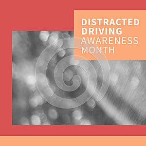 Composition of distracted driving awareness month text over blurred background