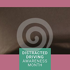 Composition of distracted driving awareness month text over blurred background