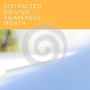 Composition of distracted driving awareness month text over blurred background