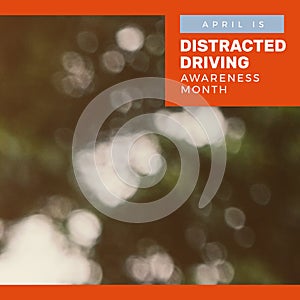 Composition of distracted driving awareness month text over blurred background