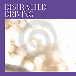 Composition of distracted driving awareness month text over light spots