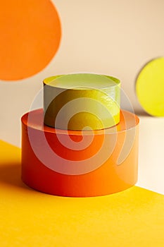 Composition with empty circle shape podiums for products presentation or exhibitions. Abstract background of different colorful photo