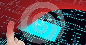 Composition of finger touching computer circuit board