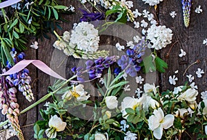 Composition with flowers - lupine, viburnum, peonies, fleur-de-lis, iris