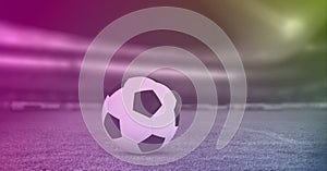 Composition of football on white line on grass pitch with copy space and pink tint