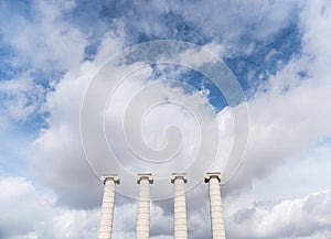 Composition of four ionic column with cloudy sky in the background / copy space / pillar /architecture / minimal style