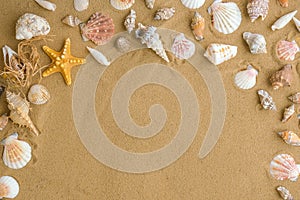Composition frame for copy space, seashells, pebbles, mockup on sand background. Blank, top view, still life, flat lay