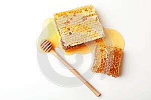 Composition with fresh honeycombs on white background
