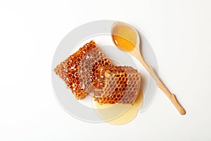 Composition with fresh honeycombs on white background