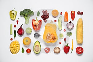 Composition with fresh organic fruits and vegetables on white background, top view