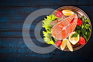 Composition with fresh salmon, herbs, parmesan and spices. Food background