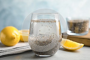 Composition with glass of water, chia seeds and lemon