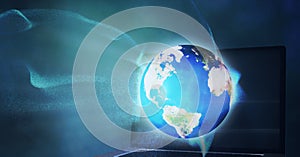Composition of glowing blue light trails over globe