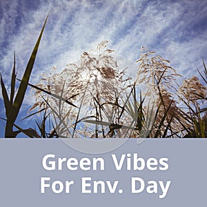 Composition of green vibes for env day text over field