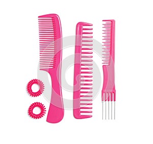 Composition with hair combs and spiral rubber bands  on white background