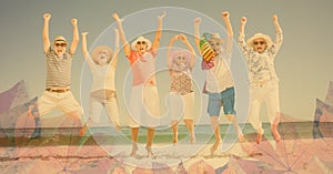 Composition of happy senior holiday group jumping raising hands, smiling on beach and autumn foliage