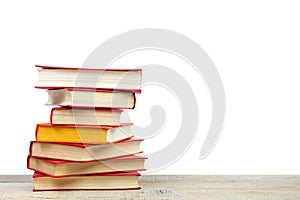 Composition with hardcover books, fanned pages, isolated on white background. Back to school. Copy Space. Education background