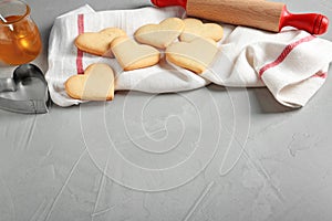 Composition with heart shaped cookies on table