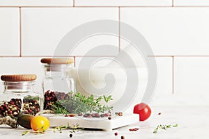 Composition of herbs and spices on the kitchen