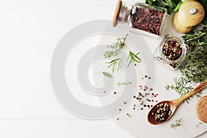 Composition of herbs and spices on the kitchen