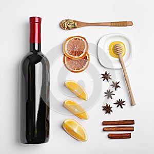 Composition with ingredients for mulled wine on white background, top view