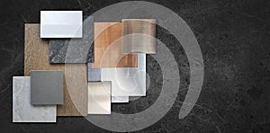 composition of interior material samples including wood veneer, ceramic tiles, multi color of aluminium metallics, travertine