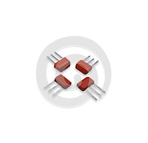 Composition of isolated orange bipolar junction transistors on the white background