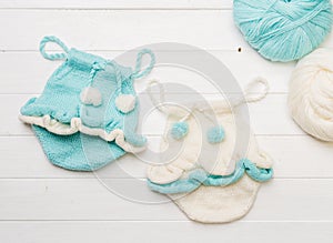 Composition of knitted suit and hat