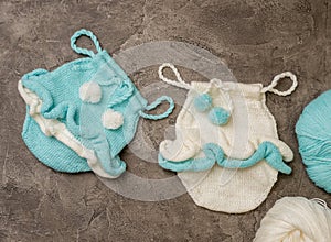 Composition of knitted suit and hat