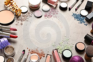 Composition with makeup products and Christmas decor on table