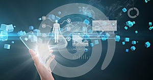 Composition of male doctor holding interactive screen with medical data processing