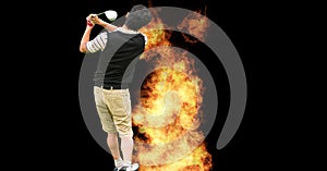 Composition of male golf player over flames on black background