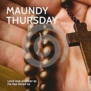 Composition of maundy thursday text over hand holding rosary