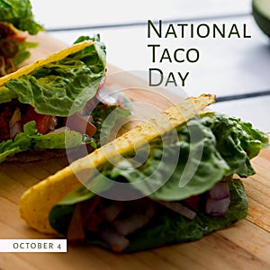 Composition of october 4 national taco day text with tacos on cutboard