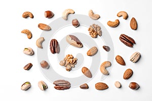 Composition with organic mixed nuts on white background