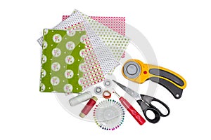 Composition of patchwork quilting instruments, items and fabrics