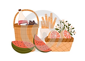 Composition of picnic baskets with delicious meals and snacks for outdoor romantic dinner bottle of wine, breadsticks