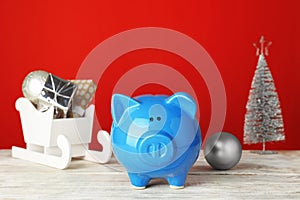 Composition with piggy bank and Christmas decor