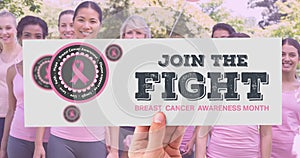 Composition of pink ribbon logo and breast cancer text, with diverse group of smiling women