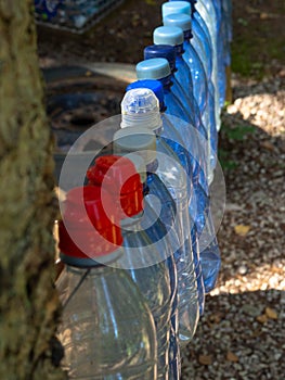 Composition with plastic bottles of mineral water. Plastic waste